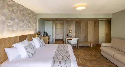 Junior Suite, 1 King Bed, Non Smoking (with Sofabed) | Pillowtop beds, in-room safe, individually decorated, desk