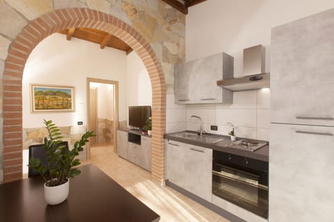 Suite, Garden View | Private kitchen | Coffee/tea maker