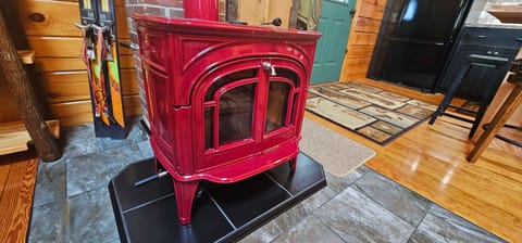 Cozy up around the wood-burning fireplace with your crew