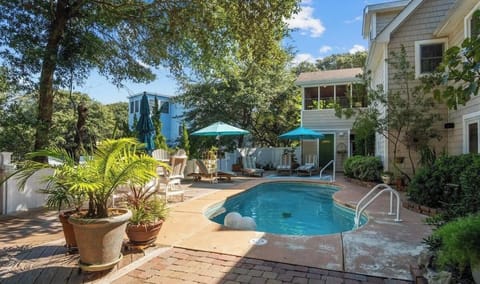 Dive into paradise in your own private oasis! Enjoy the serene ambiance of this fenced pool surrounded by lush landscaping. Your ultimate relaxation spot awaits!  #PoolParadise #LushLandscaping #Staycation
