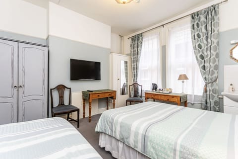 Standard Triple Room, Shared Bathroom | Free WiFi, bed sheets