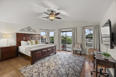 Retreat to this expansive master sanctuary featuring a handcrafted wood king bed, premium linens, and private balcony overlooking the water.