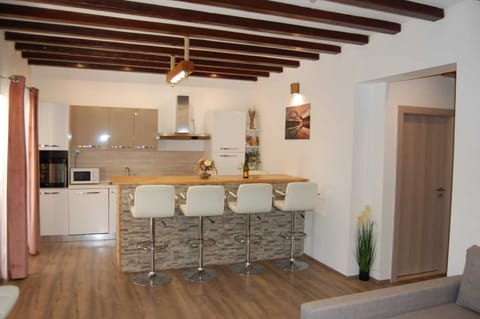 House (Holiday Home Luca) | Living room | 32-inch flat-screen TV with cable channels