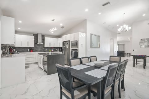 Modern kitchen with huge dining table
