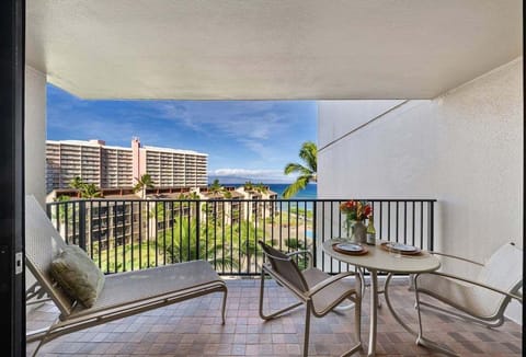 Furnished lanai with ocean and neighbor island views