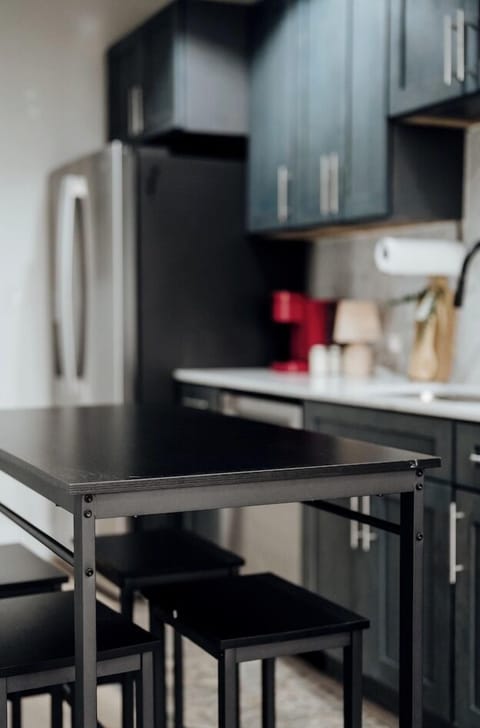 This table serves as an island or dinner table