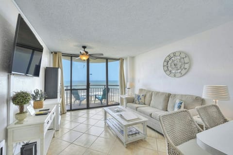 The ocean front living room is well-appointed with comfortable furnishings.