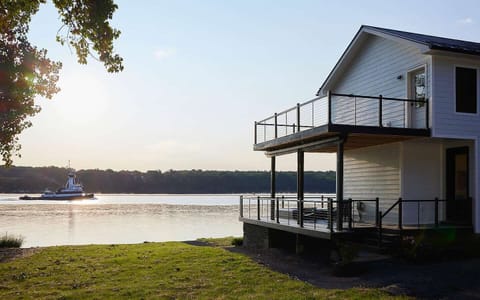 Gorgeous riverfront house with hot tub, river view in all 3 bedrooms, two feel like you're right on the water