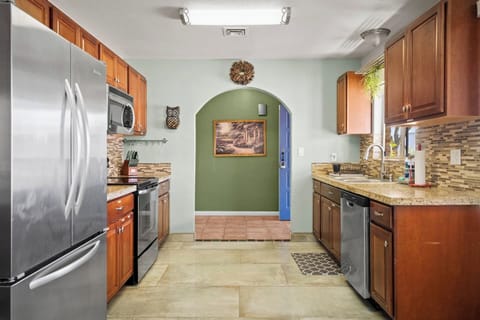 You can cook up wonderful meals in this spacious and fully stocked kitchen.