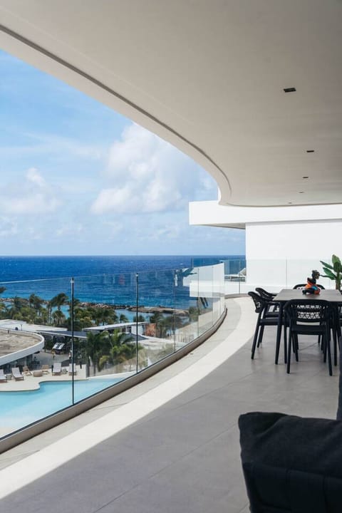 Wake up to breathtaking ocean views and unwind on this spacious balcony. The perfect spot to relax, dine, and enjoy the sea breeze during your stay.