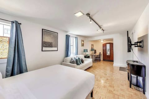 Large studio room is all yours.  It's very spacious featuring a Queen size bed, large sofa, TV and a desk.