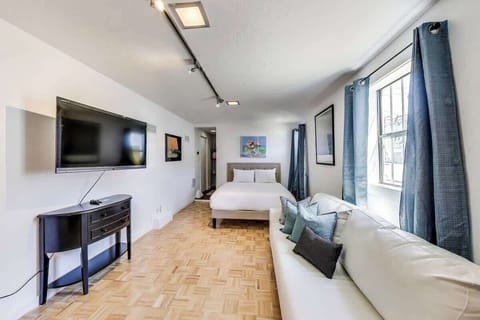 The studio room is very spacious. with a Queen size bed, large sofa, Desk and Television.
