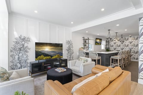 Luxury living throughout. 65` Smart TV, comfortable seating and an 8 top bar with a 55` TV!