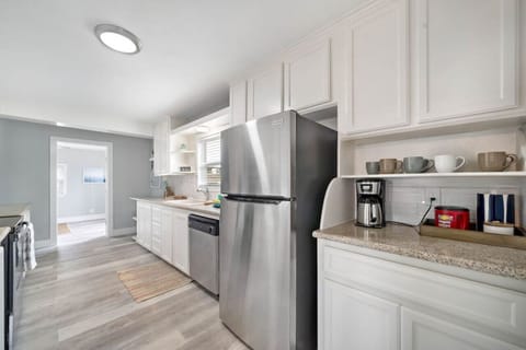Culinary perfection meets refrigeration innovation in our kitchen with a spacious fridge