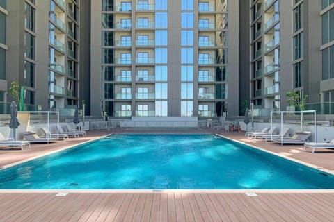 Pool Oasis: Dive into luxury at our stunning pool surrounded by sleek modern architecture!