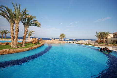2 outdoor pools, pool umbrellas, sun loungers