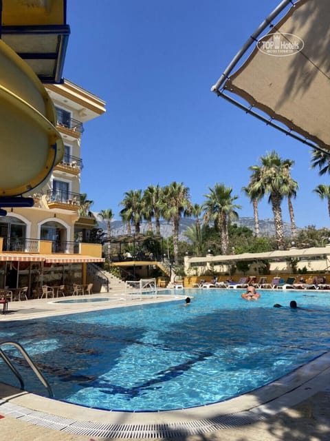 Seasonal outdoor pool, pool umbrellas, sun loungers