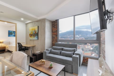 Standard Apartment, City View | Living area | 40-inch Smart TV with cable channels