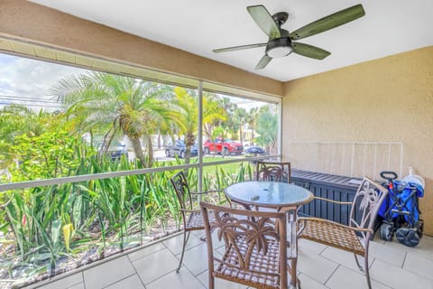 Tropical lanai with alfresco dining and lounging.