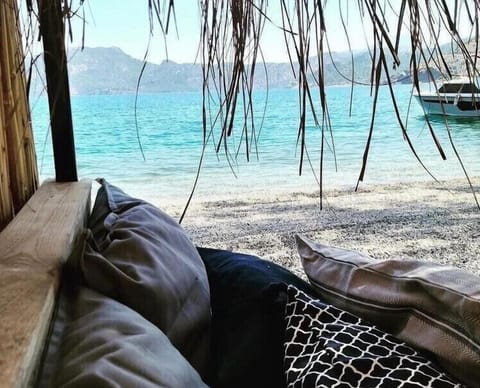 Private beach nearby, black sand, sun loungers, beach umbrellas