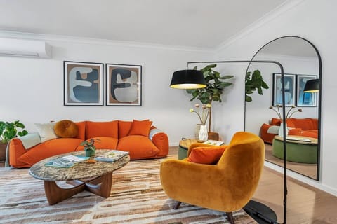 Lounge room with wall mounted reverse cycle air conditioning