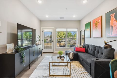 Spacious living room with stylish decor, perfect for unwinding after a day of exploring the local area.