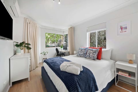 Relax in your stylish bedroom with large built in wardrobe, Smart TV, split system air conditioning, desk and ergonomic chair. 