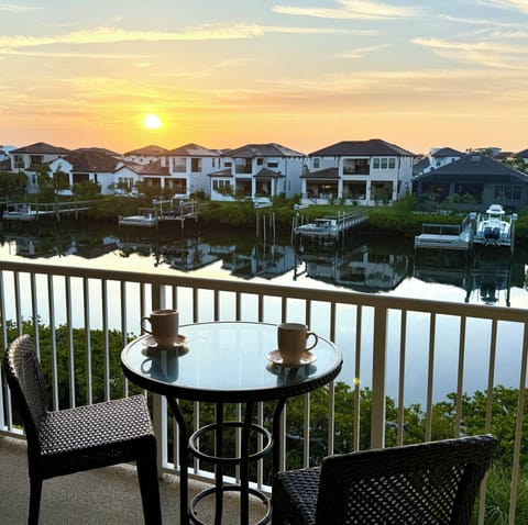 Enjoy stunning sunrises from the balcony, overlooking a peaceful canal view.