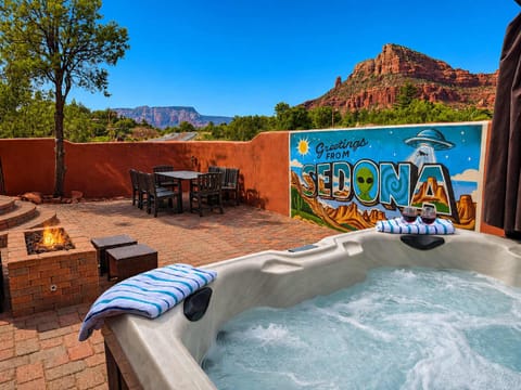 Private hot tub and fire pit, the perfect setting for relaxing outdoors with Sedona red rock views.