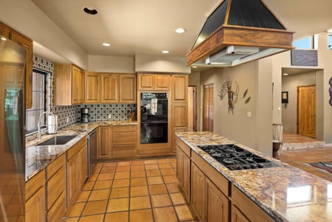 Prepare delicious meals in the fully equipped modern kitchen.