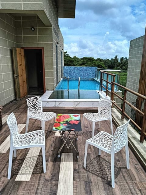 Standard Single Room, Balcony, Pool View | Terrace/patio