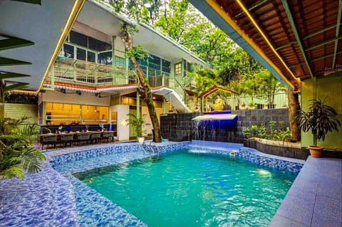 Outdoor pool, open 1:00 PM to 9:00 PM, pool umbrellas, sun loungers
