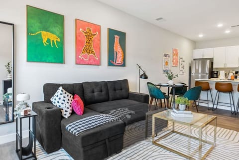 As you take a seat in the living room, the comfortable furniture and tasteful design make it easy to unwind.