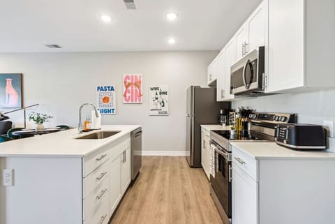As you step into the kitchen, the clean lines and functional design make you eager to start cooking your favorite dishes.