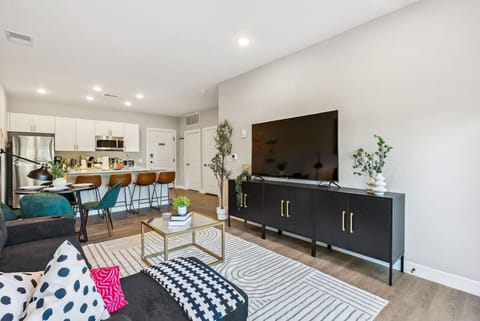 Relax in the living room and watch your favorite shows, lounging is a great way to unwind after a long day.