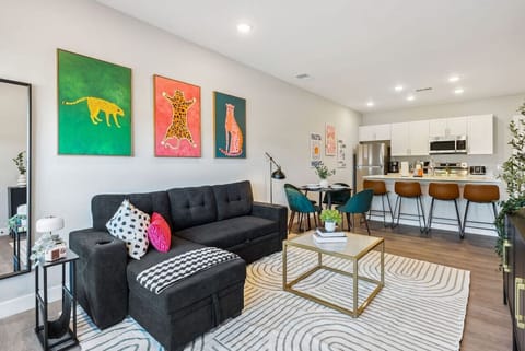 As you take a seat in the living room, the comfortable furniture and tasteful design make it easy to unwind.