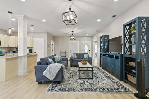 Cozy up in the living room, where natural light meets modern comfort—complete with a smart TV for your favorite shows and movies!