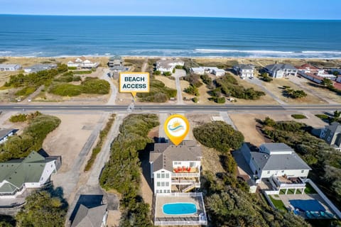 Whether you're watching the sunrise from a furnished deck or gathering for a family dinner, every detail of this home is meant to enhance your Outer Banks vacation experience.