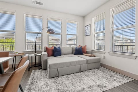 Spacious living room with stylish decor, perfect for unwinding after a day of exploring the local area.