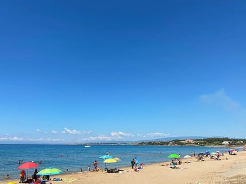 Private beach nearby, white sand