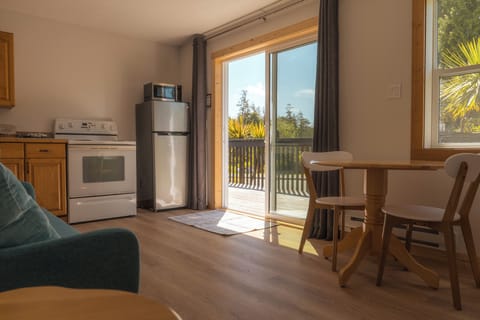 Deluxe Bungalow, 1 Queen Bed, Non Smoking, Kitchen | Living area | 32-inch LED TV with digital channels, streaming services, printers