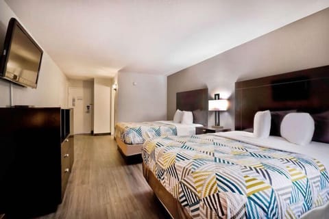 Deluxe Double Room, 2 Queen Beds, Non Smoking, Kitchenette | Desk, laptop workspace, blackout drapes, iron/ironing board