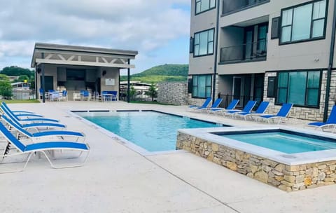 View of our bottom floor corner unit. Walk right out your door and enjoy the Pool, Hot Tub, and covered patio.