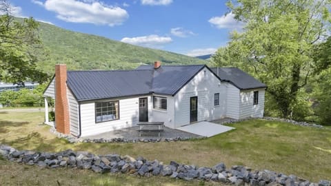 Exterior view of Grandma’s House surrounded by nature