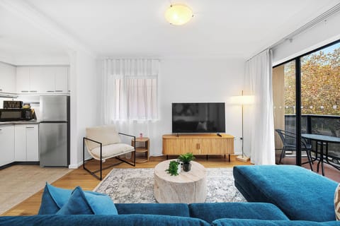 Bright and airy living space filled with natural light, boasting direct access to a private balcony – perfect for your morning coffee or evening relaxation. 