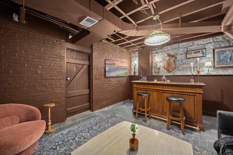 Bar: Mix up your favorite drinks at this unique and stylish bar area, perfect for evening relaxation. (Alcohol shown for display only and is not for guest consumption.)