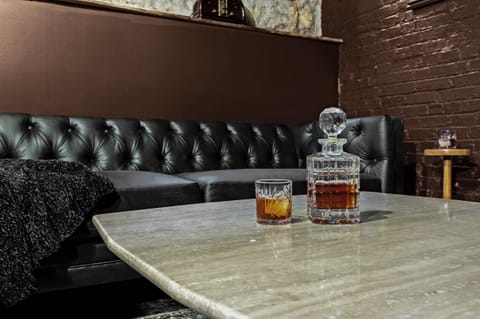 Bar: Mix up your favorite drinks at this unique and stylish bar area, perfect for evening relaxation. (Alcohol shown for display only and is not for guest consumption.)