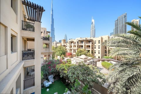 Balcony View: Savor stunning skyline vistas while surrounded by lush greenery and vibrant blooms!