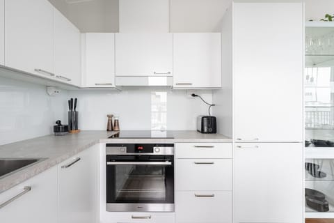 A fully equipped, modern kitchen with top-of-the-line appliances—from morning coffee to gourmet dinners.