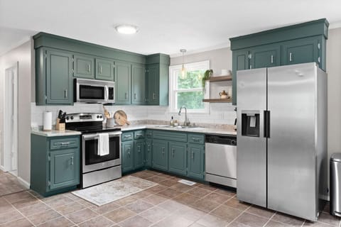 Fully equipped kitchen with modern upgrades and timeless charm.
